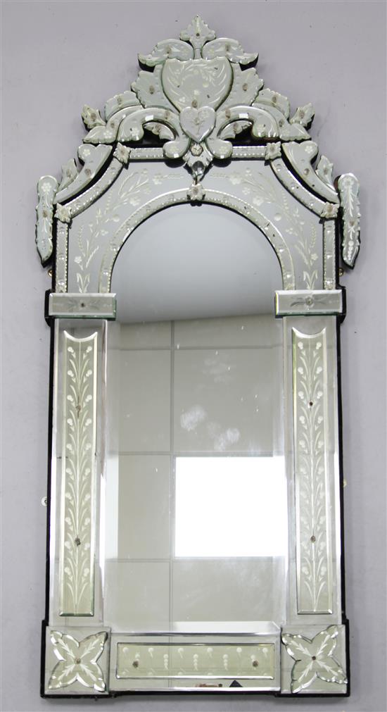 A Venetian style etched glass wall mirror, W.2ft 3in. H.4ft 8in.